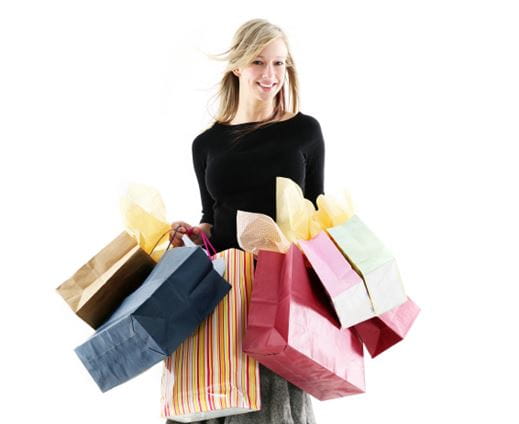 Mujer con bolsas de la compra